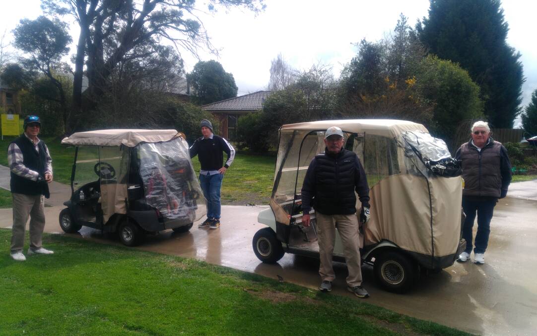 READY: Wet conditions did not stop keen golfers going out for a hit on Saturday. A few of the regulars didn't show up, though.