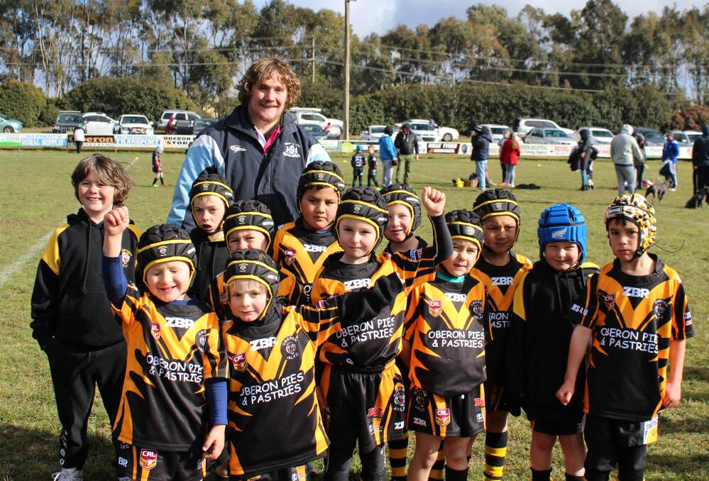 YOUNGEST: Oberon Junior Rugby League under 6s with their 2018 coach Kyall Ryan. The junior league presentation day will be held this Saturday.
