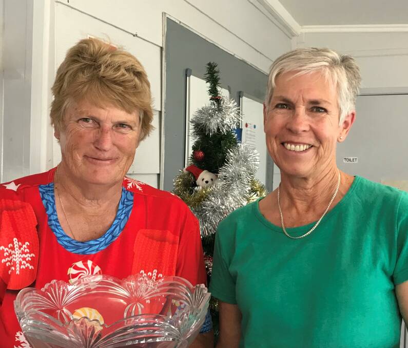 HAPPY: Oberon Women's Golf Club president Jenn Capel (right) with club champion Robyn Slattery, who is holding the champion's perpetual trophy.
