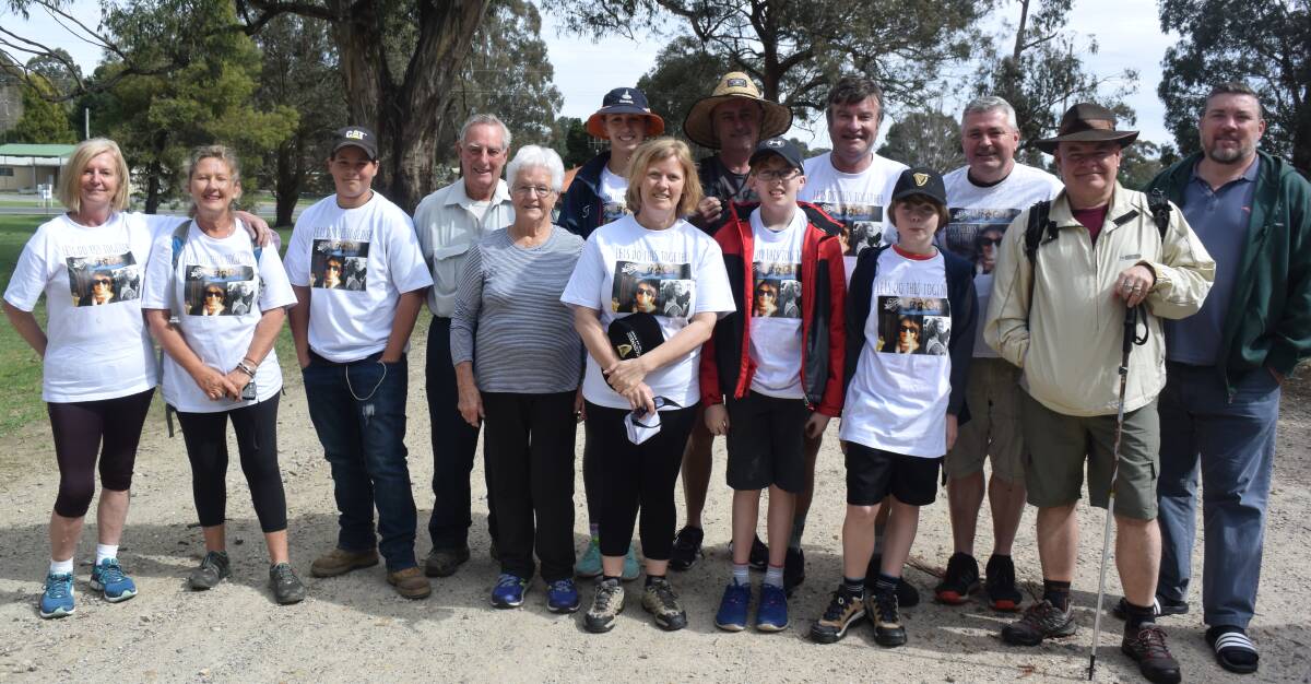 SUPPORT: Frank and Eileen Hanrahan, fourth from left, at Vulcan Forest park at Black Springs to greet The Paddy’s Pub to Pub 2 - You'll Never Walk Alone walkers.