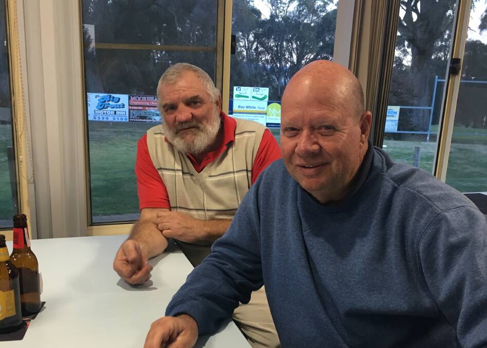 KEEN: Laurie Murphy and Steve Serong braved freezing conditions to play golf on Saturday.
