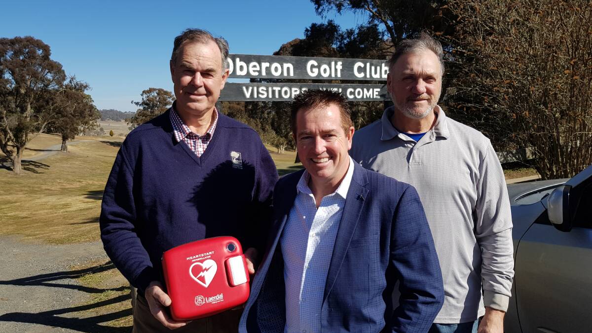 VISIT: Barry Lang and Alan Cairney with Member for Bathurst Paul Toole at Oberon Golf Club.
