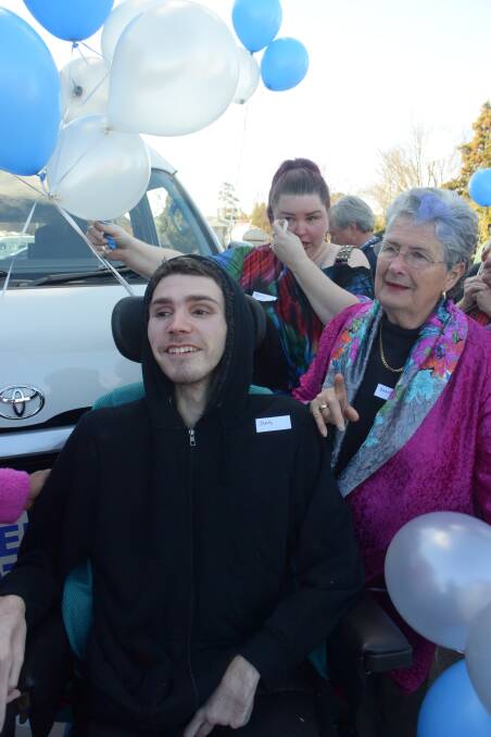LIFE CHANGING: James Baxter received a modified vehicle on his 22nd birthday. He is pictured with Rotary president Brenda Lyon and mother Beth O'Shea.