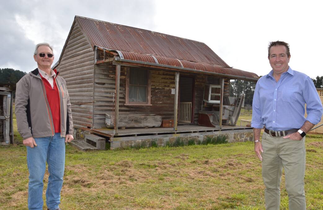 SUPPORT: Bathurst MP Paul Toole, right, with Col Roberts outside the 1887 Museum Cottage which is set to receive restoration work.