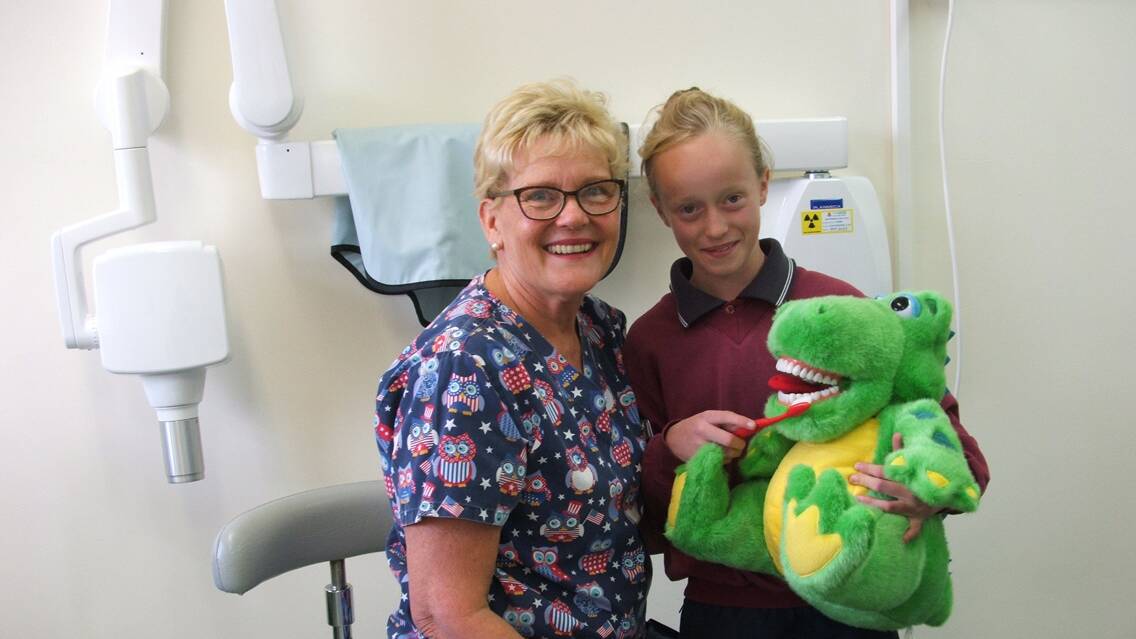 SMILE:  Dental therapist Jenny James with Charlie Kilby, the first patient at the new clinic at the Oberon Multipurpose Service.