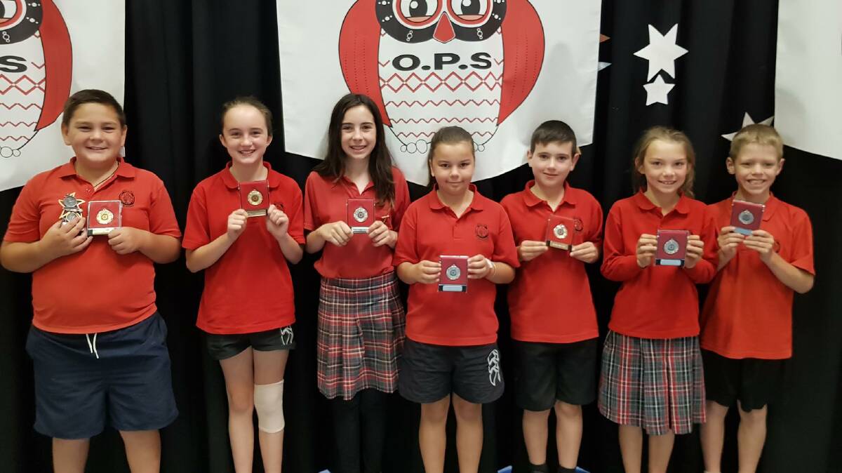 PROUD: Oberon Public School students with their silver and gold medallions in recognition of their outstanding school citizenship.