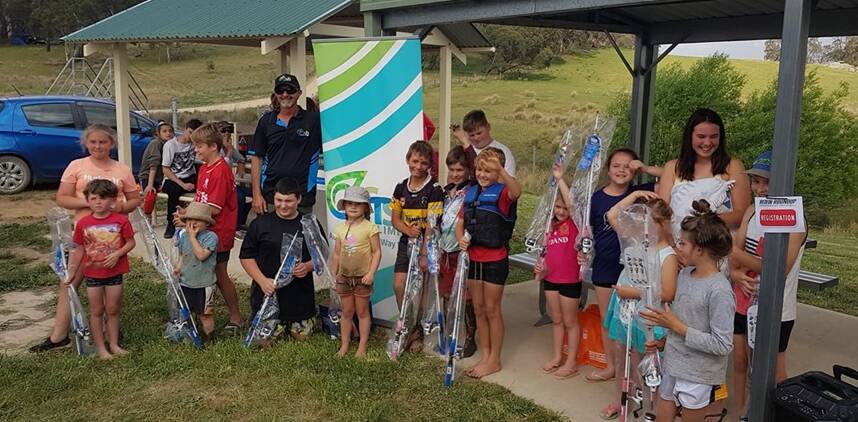 SUCCESS: Children and their prizes after Saturday's round of fishing in the Redfin Roundup, which was held for the second time at Oberon Dam.