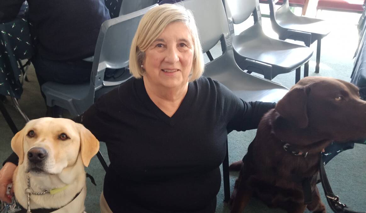 VISITORS: Oberon Hospital Auxiliary president Annabelle Gilbert with two of the companion dogs in 2019.