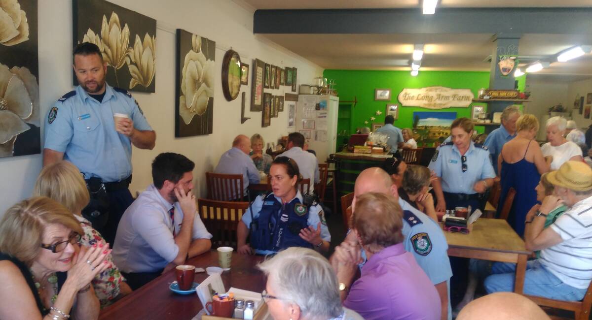 I HEAR YOU: Officers and members of the community chat in Oberon last week. Photo: KIM ARNOTT