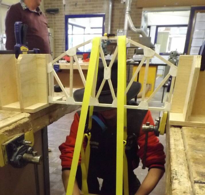 HEAVY: Oberon High School's Malcom Voerman with the truss he designed for his HSC engineering studies course.