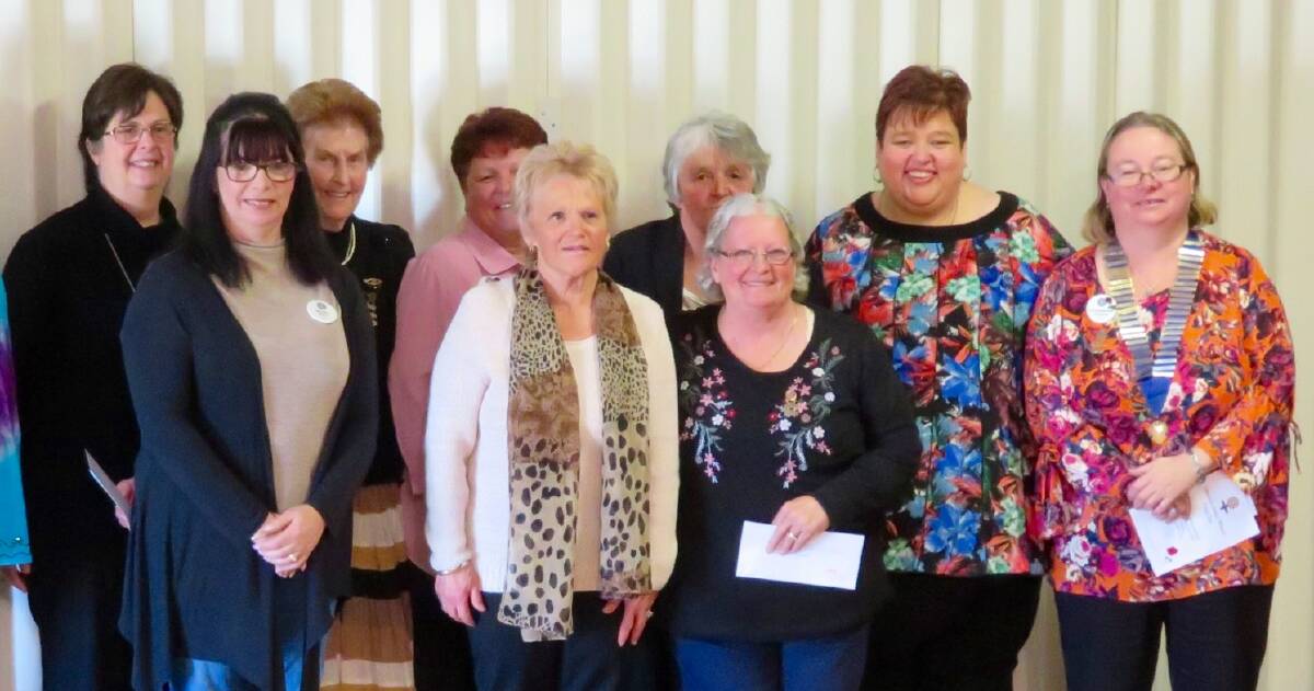 SMILE: Oberon Inner Wheel's new committee and new members at the changeover luncheon held recently. The luncheon featured some special guests.