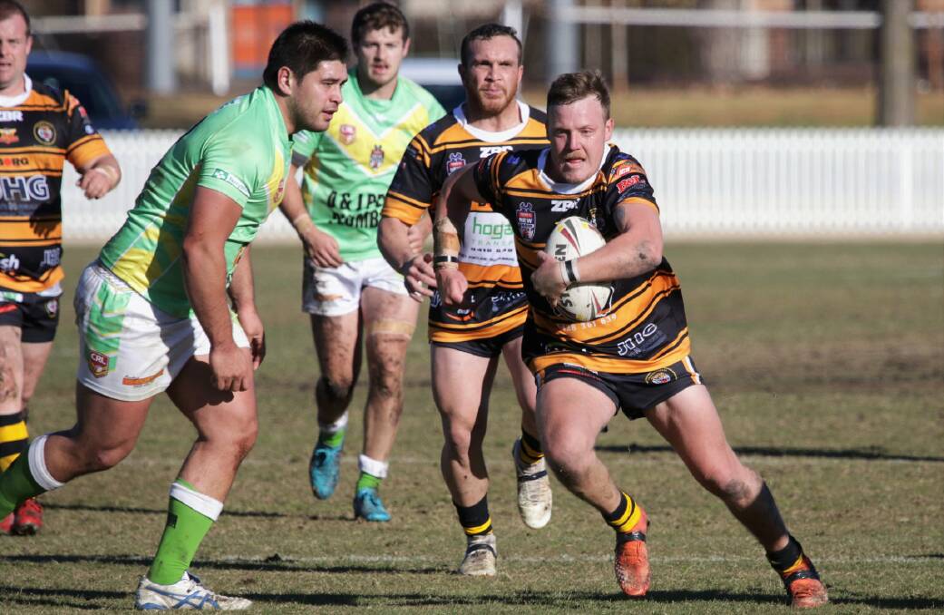 FORWARD: Oberon Tigers' Blake Fitzpatrick charging forward in last Sunday's 52-12 loss to a full-strength Orange CYMS.