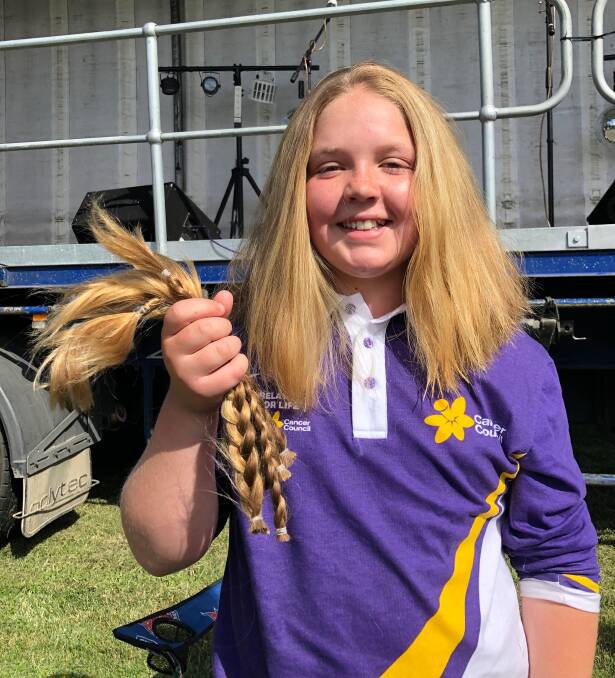 GONE: At the Relay For Life event Georgie Pincott cut 30 centimetres off her hair to make wigs for those in need.