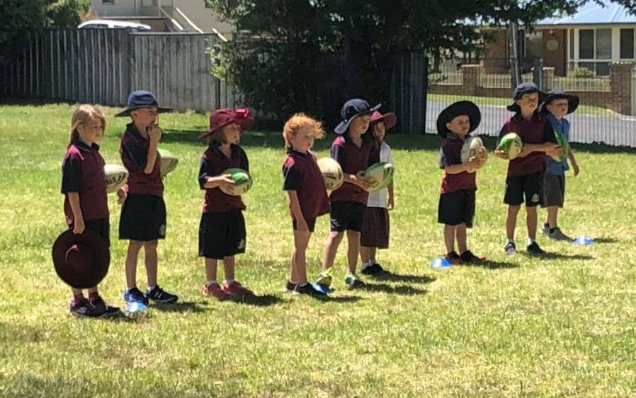LEARNING: St Joseph's School infants children enjoyed an NRL session with a development officer with Western NSW NRL.