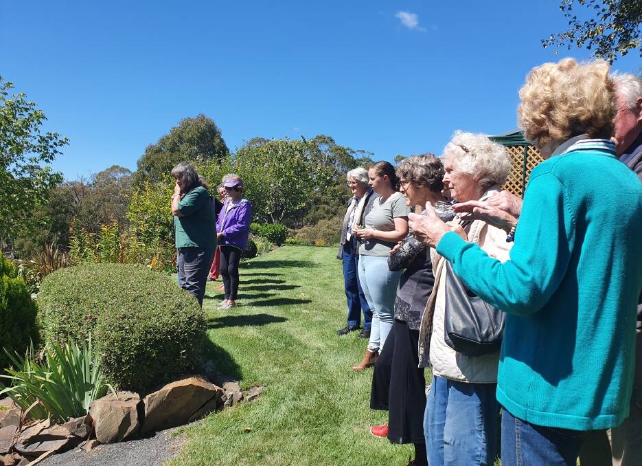 GROWING INTEREST: Oberon Garden Club members inspecting Bernice and Wayne Keft's spectacular garden.