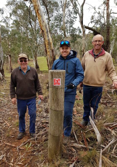 READY: Local cyclists Tim Arnison, Mathew Webb and Peter Low spent a day upgrading the signage for Oberon's southern walking/cycling route.