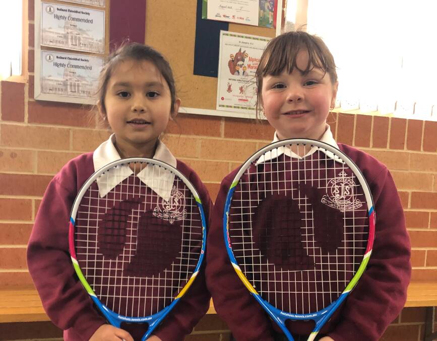 MATCH: St Joseph's School students Gurleen Kaur and Ivy Pearce are ready to play.