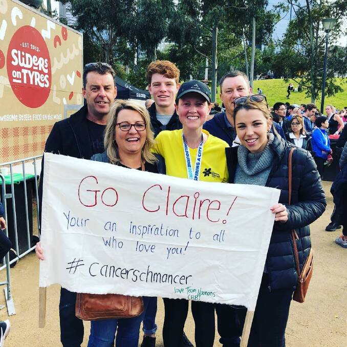 SUPPORT CREW: Claire Farrer after completing a half marathon to support Cancer Council. 