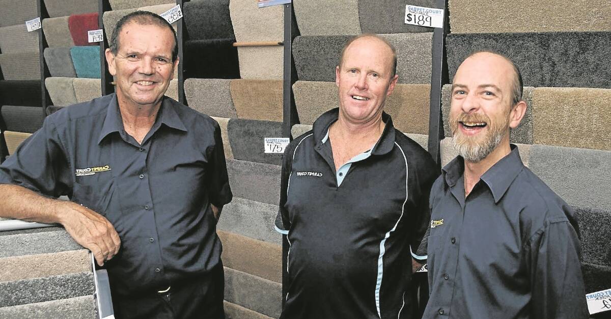 Local team, local approach: Steve Moore, Troy Bellamy and Dan Murphy from Carpet Court can help transform your home. Photo:File.