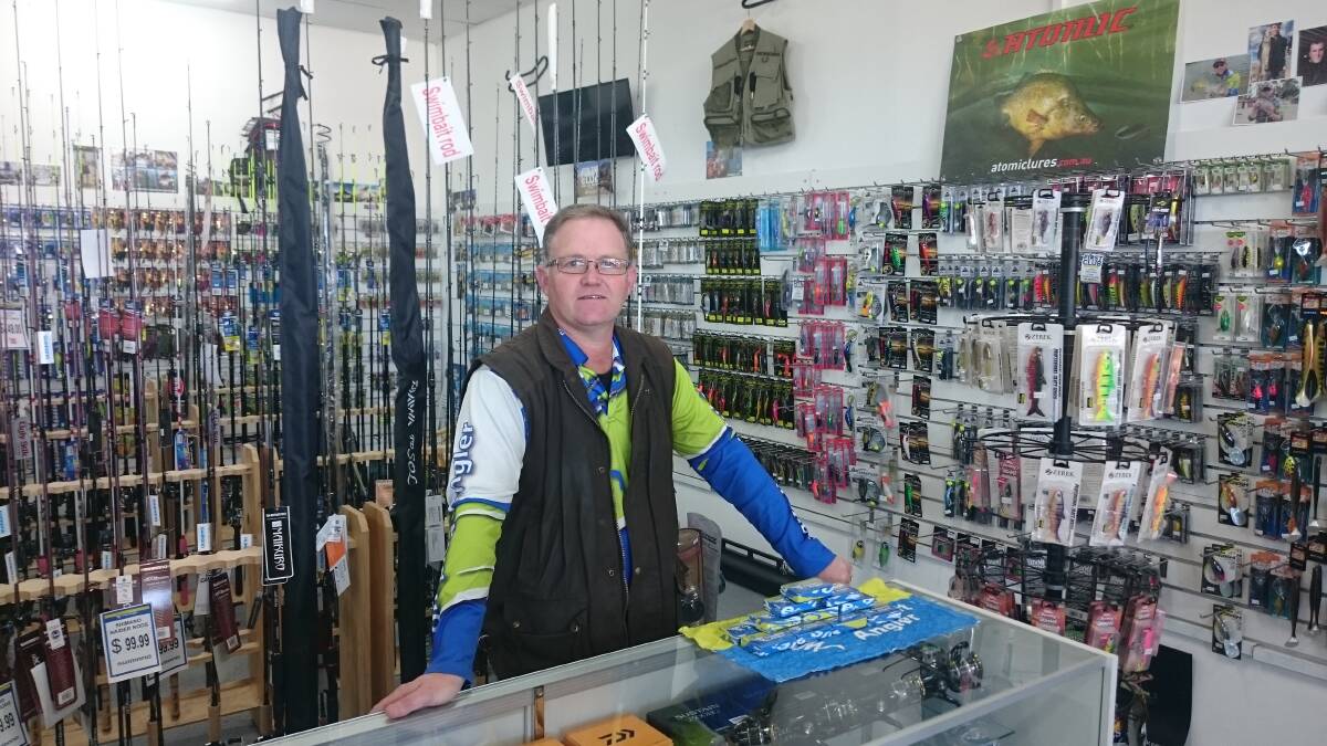 One stop shop: Garth from Compleat Angler & Campling World, has everything you need from camping chairs and pergolas, to rods, reels and lures. Photo: A.Lotherington.
