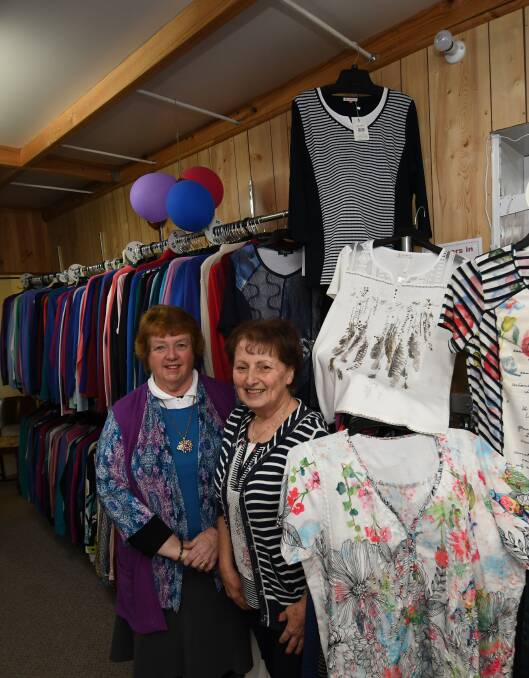 Keeping warm: Marietta's Boutique staff member Marilyn Pratley and store owner Marietta Khoury, have their winter fashion ready to keep your warm. Photo: File.