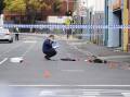 Two men were shot dead and three others injured outside Melbourne's Love Machine nightclub. (Ellen Smith/AAP PHOTOS)
