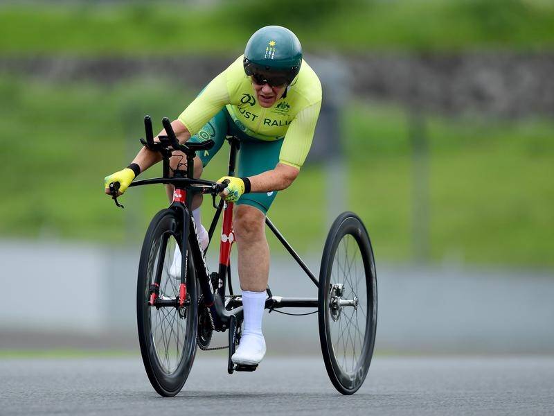 Australian Paralympics star Carol Cooke was taken to hospital after a crash in the T1-2 road race.