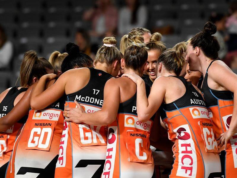 The Giants have kept their Super Netball season alive with a 69-54 win over Collingwood.