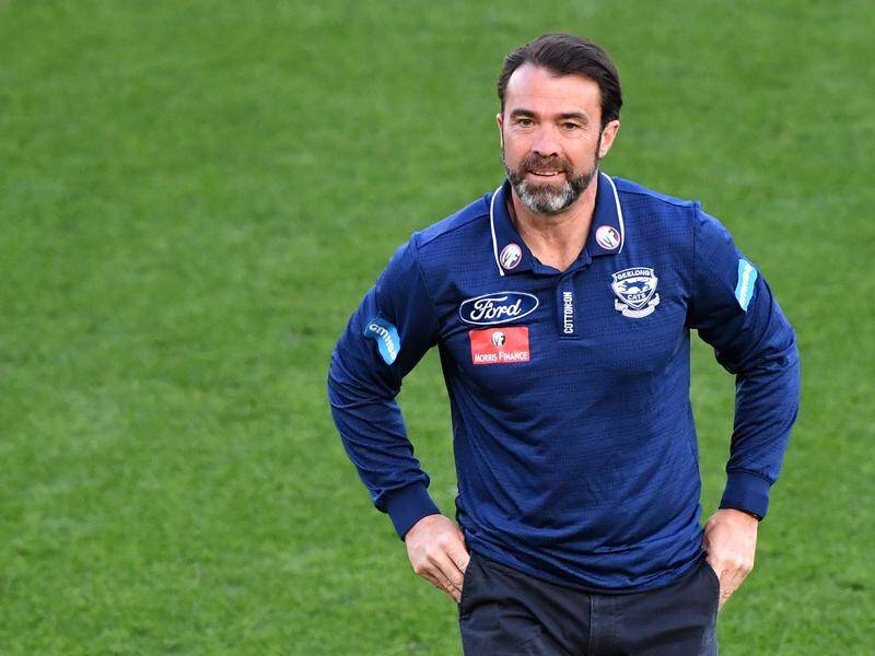 Geelong coach Chris Scott says he is enjoying the challenge of the AFL's crammed scheduling.