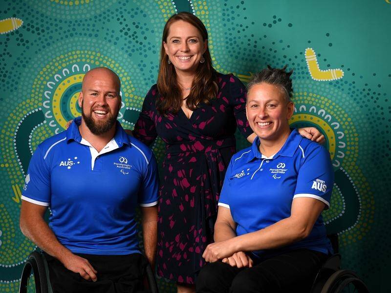 Australia's team co-captains Ryley Batt and Danni Di Toro with Chef de Mission Kate McLoughlin.