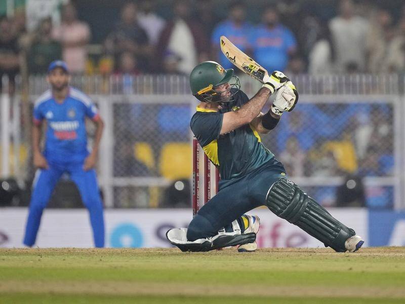 Glenn Maxwell hits a six in another incredible matchwinning innings, blasting 104no off 48 balls. (AP PHOTO)