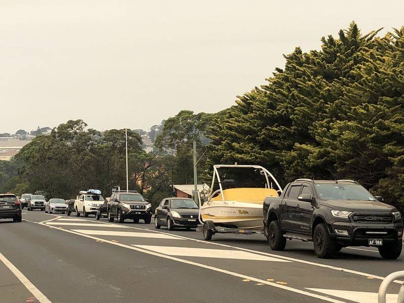 There was bumper to bumper traffic slowly moving through Ulladulla as people escape the bushfires.