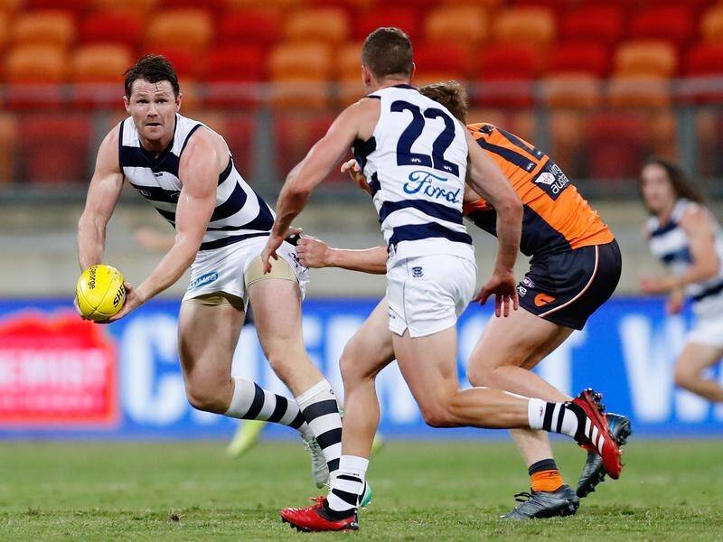 Geelong's Patrick Dangerfield (L) is unsure on the longevity of 16-minute quarters when AFL resumes.