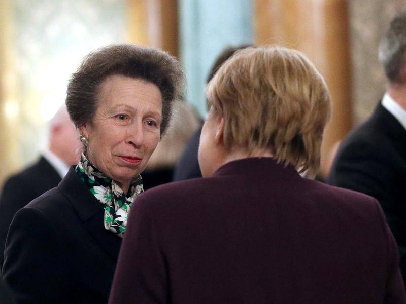 Princess Anne, seen here talking to Germany's Angela Merkel, is turning 70.