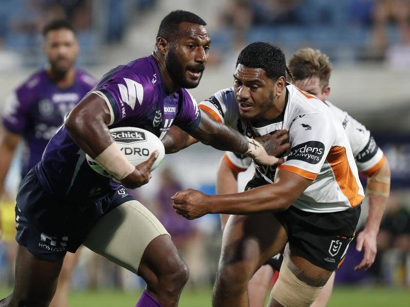 Winger Suliasi Vunivalu (L) was one of three Storm players injured in the 50-22 win over the Tigers.