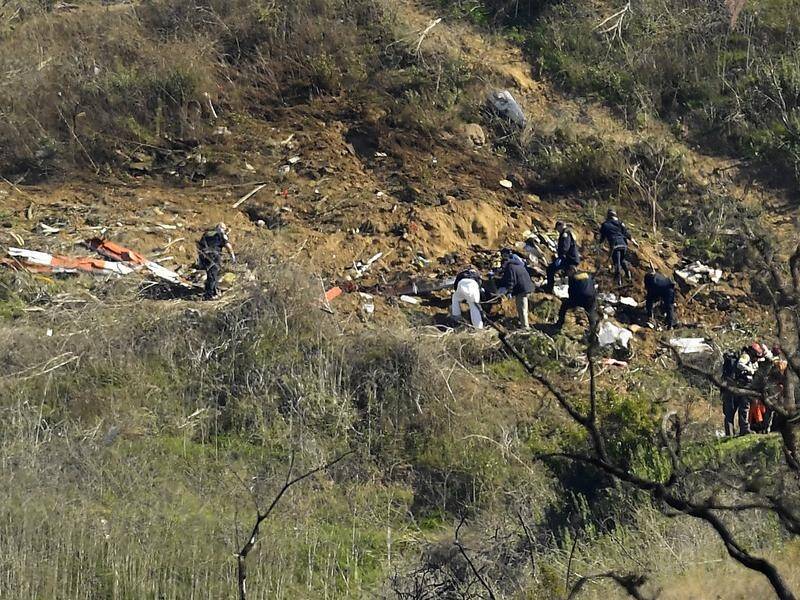 Investigators are at the scene of the helicopter crash that killed Kobe Bryant and eight others.