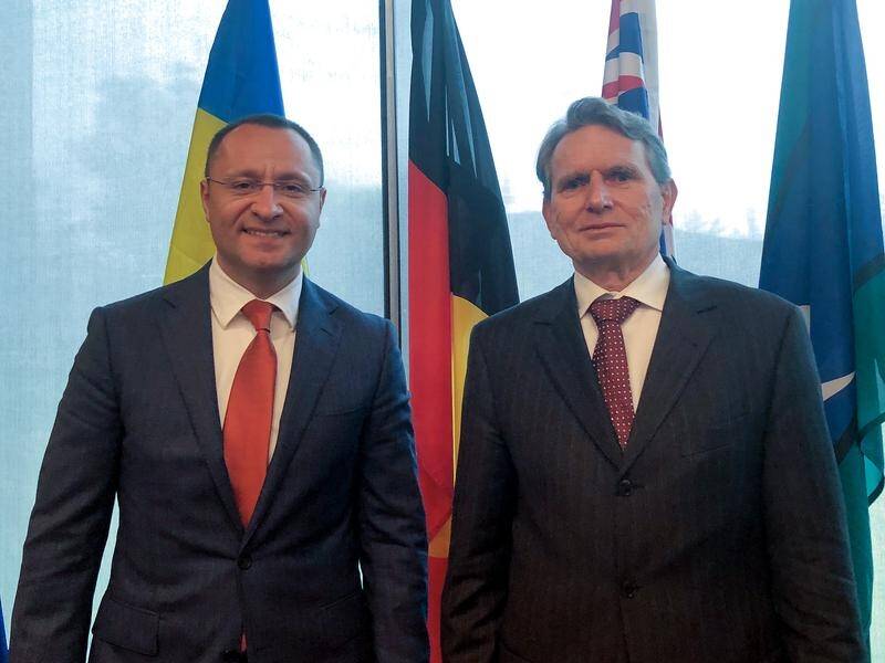 Ukrainian ambassador Vasyl Myroshnychenko (left) with EU ambassador Michael Pulch.