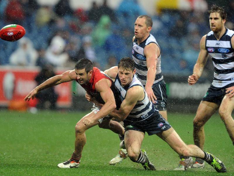 AFL premiership-winning player Shannon Byrnes (l) has joined ex-club Geelong as a development coach.