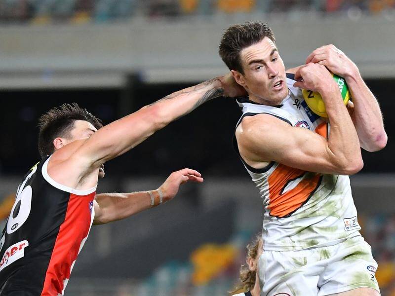 Geelong and GWS have opened talks around Jeremy Cameron (r) with the Giant hoping to join the Cats.