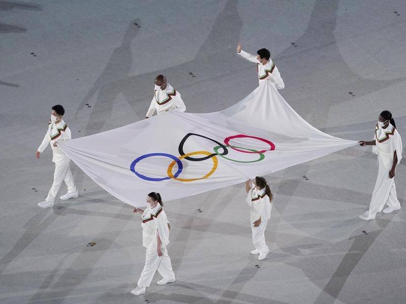 Melbourne doctor Elena Galiabovitch, second left, was honoured as one of the Olympic flag-bearers.