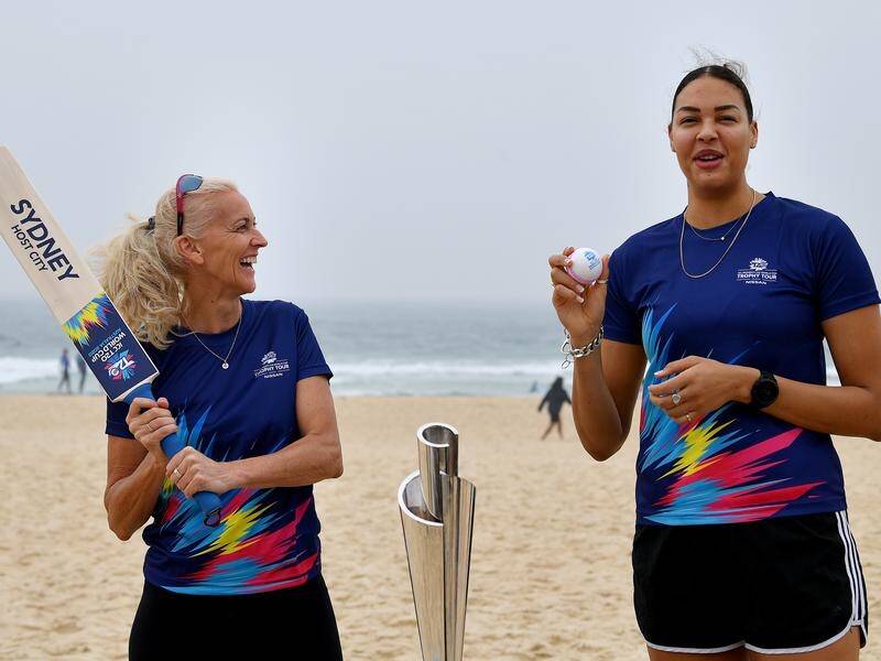 Liz Cambage poses with Kerri Pottharst during the launch of the women's T20 World Cup in Sydney.