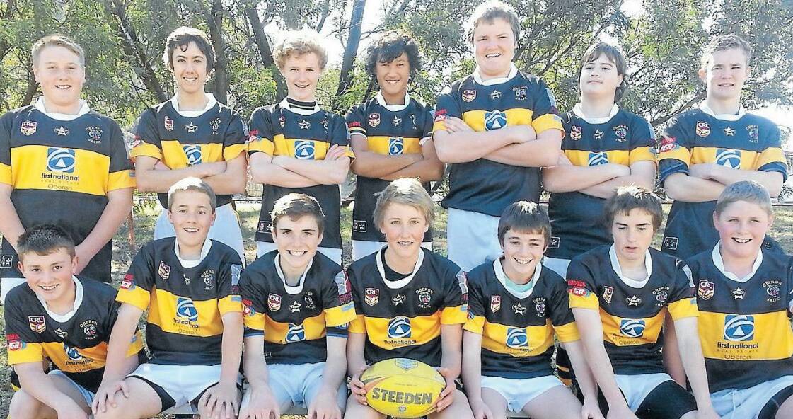 READY FOR ACTION: The 2014 under 14s team. Back row, Chris Weekes, Charlie  Schrader, Ryan Mawhood, Deshion Alogie Heine, Joe Rich, Mitchell Roels and Jy Rice. Front row: Josh Crye, Ray Sargent, Tyson Rice, Sam Walsh, Ryan Thompson, Chris Dunbar and Wil Melchers.