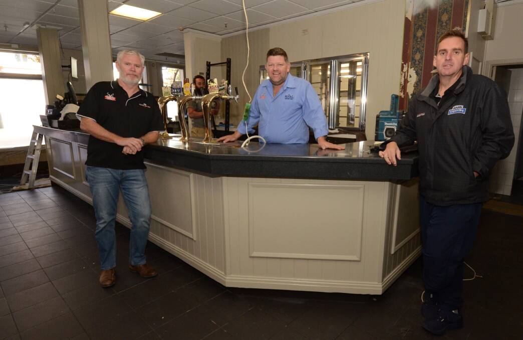 Royal Hotel manager Adam Isbester (centre) with owners Nick McKechnie and Nelson Kelly.