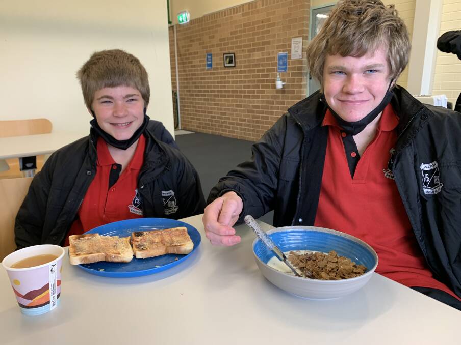 BREAKFAST: Wyatt Day and Jesse-James Day enjoying the most important meal of the day. Picture: SUPPLIED