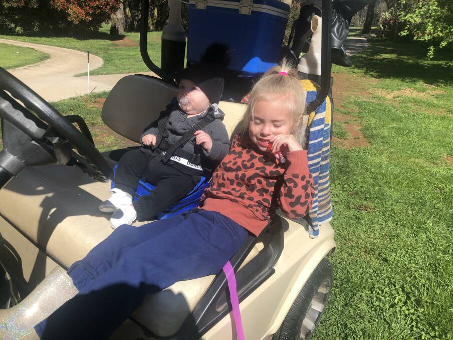 ON THE COURSE IN NO TIME: Oberon's two youngest budding golfers accompanying their dad, Blake at the course for the Two Person Ambrose on Sunday. Photo: SUPPLIED