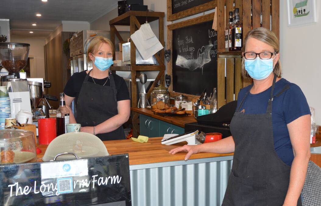 SUPPORT LOCAL: The Long Arm Farm Cafe owner Kim Arnott (front) and employee Karen Lanson are encouraging residents to use their Dine and Discover vouchers. Picture: ALANNA TOMAZIN