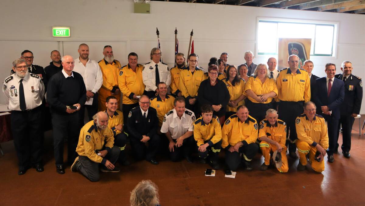 MEDAL CEREMONY: Member for Bathurst Paul Toole with RFS Commissioner Rob Rogers AFSM, Oberon Mayor Mark Kellam, RFS Area Commander Chief Supt. Tim Butcher, Chifley/Lithgow District Manager Inspector Mick Holland, and medal recipients. Picture: Supplied
