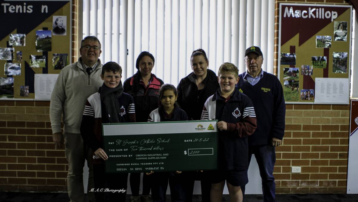 The Oberon CRT donated a cheque to the St Joseph's students. Photo: Supplied