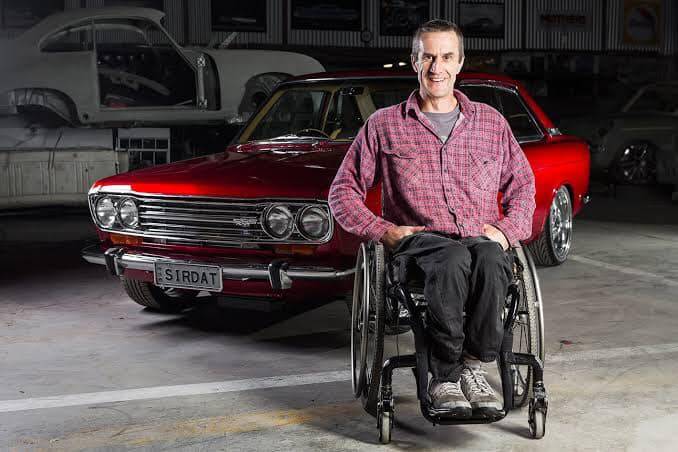 Lithgow's Todd Bulkeley with his red Datsun 1600 SSS Coupe. Photo: Hosking Industries