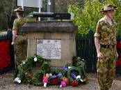 ANZAC DAY: Cadets stand with the Rydal war memorial.